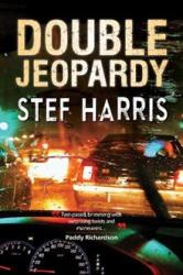 The book cover for Double Jeopardy by Stef Harris includes the quotation &#039;Fast-paced, brimming with surprising twists and maneuvers&#039; Paddy Richardson

The image is the view through the wet windscreen of a car with just a hint of a blurred wiper going past. You can see the instrument panel, and the surrounding cars with lights on, stoplights glowing.