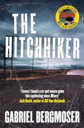 The book cover of The Hitchhiker by Gabriel Bergmoser has a yellow &quot;sticker&quot; on the front that says Bestselling Author, Must-Read Suspense, with part of the book cover and the title of The Caretaker in the middle. There&#039;s also a quote at the bottom &#039;I haven&#039;t found a cat-and-mouse game this captivating since Misery.&#039; Jack Heath, author of Kill Your Husbands.

The image is of a long, rough country road with electricity poles running alongside it, and a rail crossing right in front. There are fields off to the side, and a car barely visible through the dust it is kicking up. Overhead, a cloudy, grey and white vast sky.