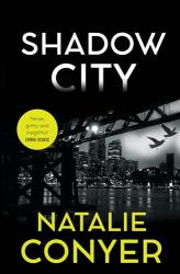 The book cover of Shadow City by Natalie Conyer includes, in a yellow &quot;sticker&quot; the quote &#039;Tense, gritty and insightful&#039; Emma Viskic.

The image is looking out from a dark space, probably under a bridge, towards a brightly lit night skyline with a couple of gulls flying across the sky. The title is at the top in white lettering, the author&#039;s name towards the bottom in yellow.