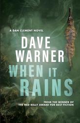 The book cover for When It Rains by Dave Warner includes the notation &#039;A Dan Clement Novel&#039; and &#039;From the Winner of the Ned Kelly Award for Best Fiction&#039;.

The image is looking straight down on a body of water which has a crocodile swimming in it to the right hand side / top of the book. The water is slightly swirly with reeds t the left. The author&#039;s name is in large white lettering, and the book title in slightly blue lettering just below that