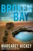 Image of the book cover for Broken Bay by Margaret Hickey includes the taglines &#039;Where truth is dead in the water&#039; and &#039;Author of Cutters End and Stone Town&#039;

The image is of a sinkhole filled with deep blue water, it has high surrounding vertical edges, sitting in the middle of dry paddocks with a small row of trees beside it. Off into the distance there&#039;s a small hill and the sky above is dark blue and cloudy.