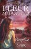 The book cover for Deception Creek by Fleur McDonald has the note &#039;Voice of the Outback Over 650,000 books sold&#039; at the top and the tagline &#039;When secrets from the past threaten, loyalties are questioned.&#039; in the middle of an image of a woman, wearing a short sleeved shirt, she has long brown hair and is looking towards her right. She&#039;s standing on the left with a farm scene in front of her - a grain bin, trees and slightly hilly paddocks. The whole thing is washed pinky dusk colour and there&#039;s a hint of the sun rising or setting in the distance. 

