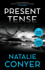 The book cover for Present Tense by Natalie Conyer includes the quote &#039;A truly remarkable book. South Africa comes to vivid life in these pages&#039; Kerry Greenwood. There are two blue &quot;stickers&#039; with text that&#039;s very blurred in this image.

The background is in black, greys and white. It&#039;s brooding and dark, with a body of water in the foreground leading towards a single hill in the background with a black, dark, cloudy sky above with a wash of whiter, lighter area just above the hill. There&#039;s a small piece of barbed wire sticking out from the right hand side.