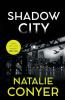 The book cover of Shadow City by Natalie Conyer includes, in a yellow &quot;sticker&quot; the quote &#039;Tense, gritty and insightful&#039; Emma Viskic.

The image is looking out from a dark space, probably under a bridge, towards a brightly lit night skyline with a couple of gulls flying across the sky. The title is at the top in white lettering, the author&#039;s name towards the bottom in yellow.